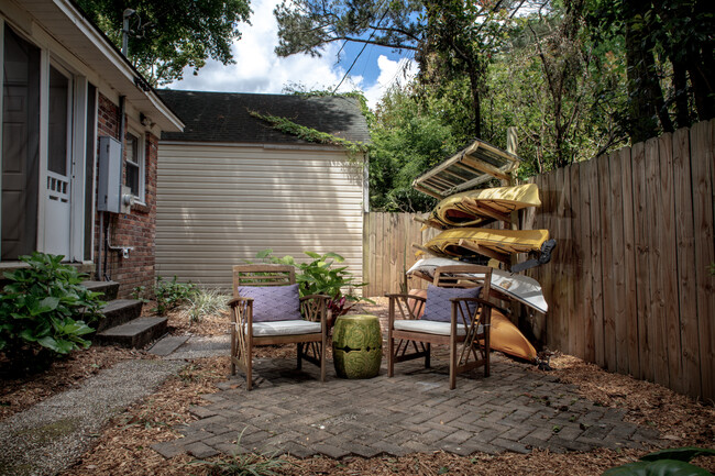 Private Courtyard space with flowering shrubs - 1408 E 48th St