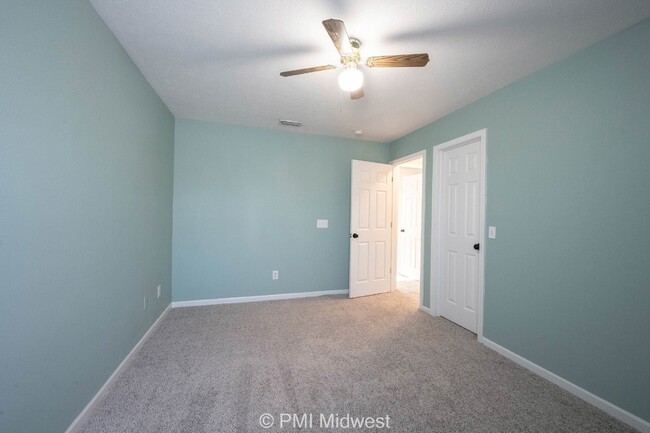 Building Photo - "Spacious 4-Bedroom Gem with Finished Base...