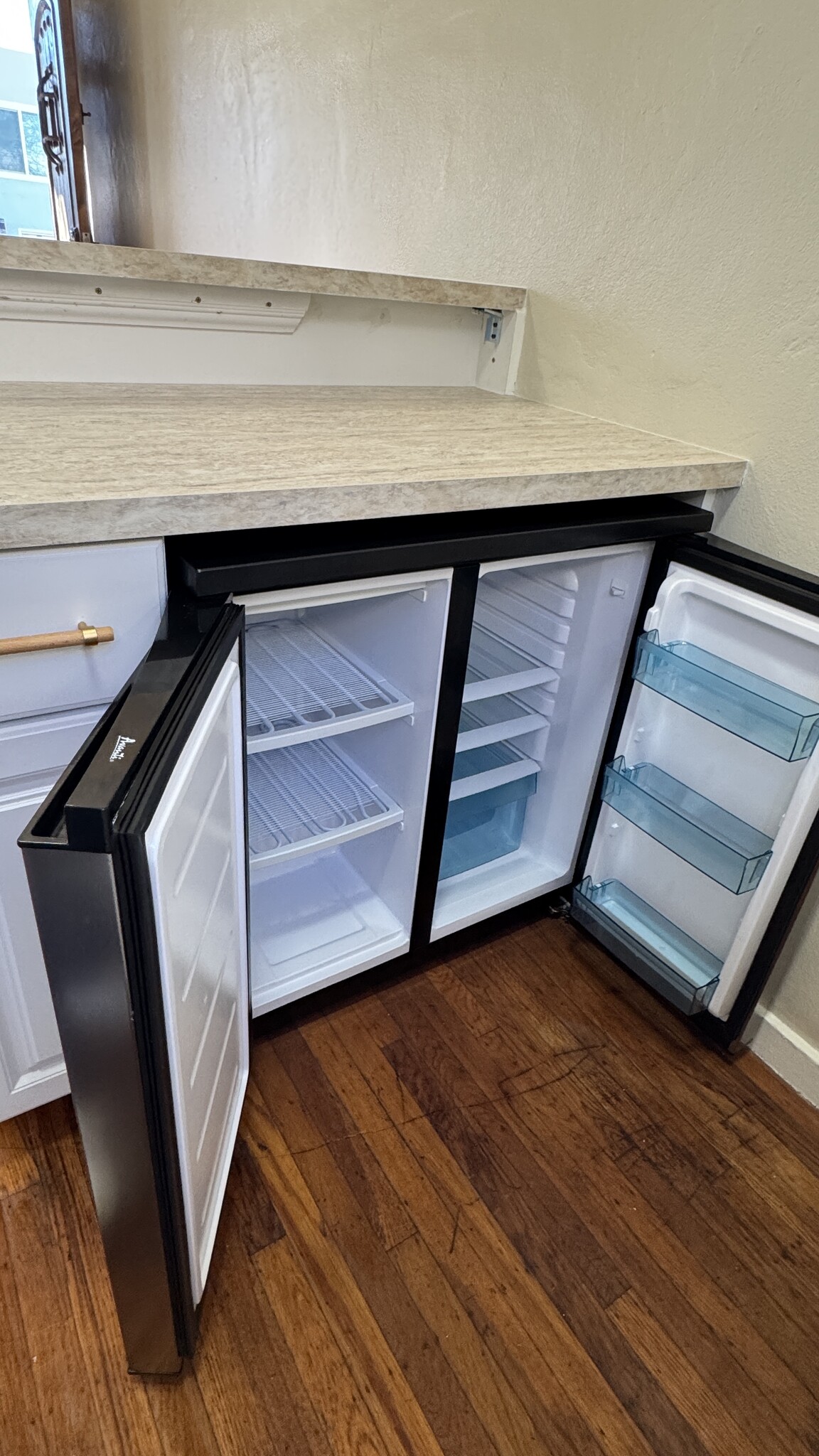 New under counter fridge/ freezer - 6401 Fairmount Ave