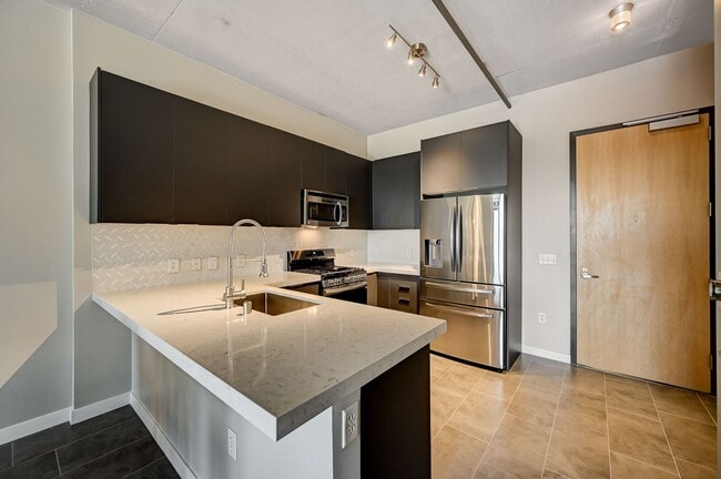 Building Photo - Fully Furnished 4th-Floor Condo with Stunning Downtown Views!