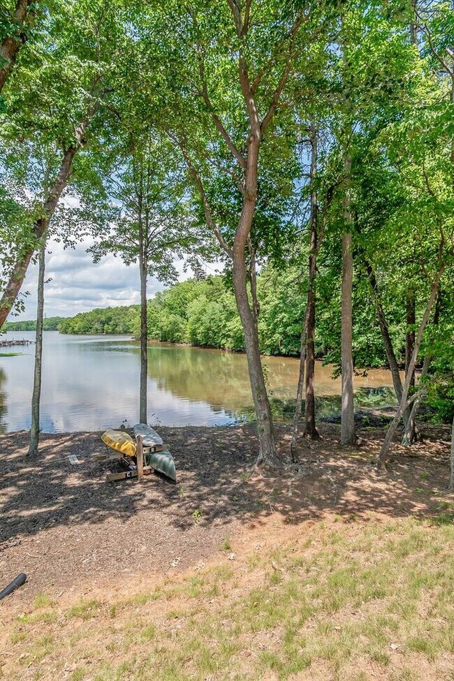 Building Photo - Waterfront Living at Its Finest - Beautifully Remodeled 3BR/2BA, 1st Floor, End Unit Condo on Lak...