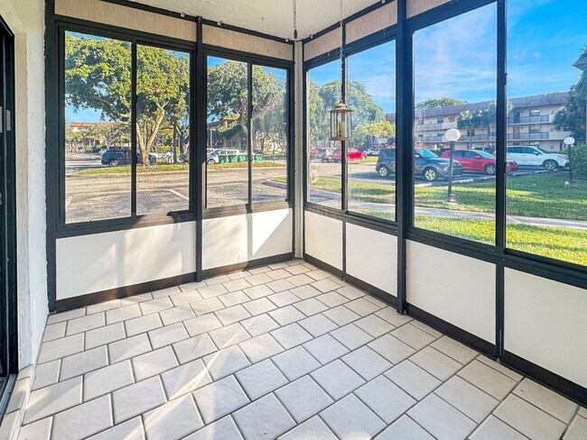 Building Photo - 6090 N Sabal Palm Blvd