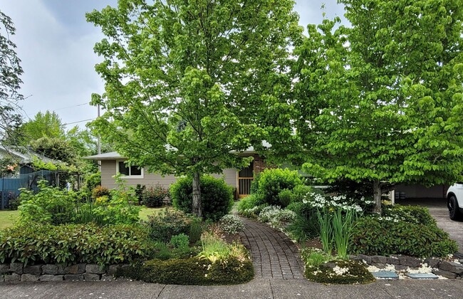 Building Photo - Gorgeous 4-bedroom home including a Two Car Garage and Spacious Backyard with a Shaded Patio