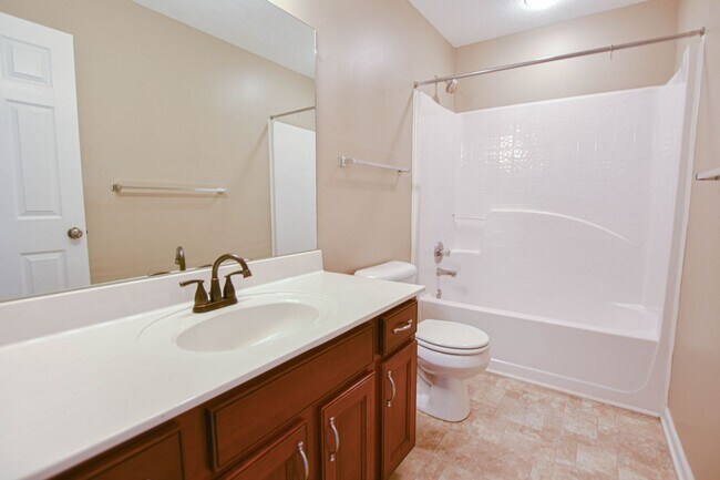 Building Photo - Pet Friendly Three Bedroom with Bonus!