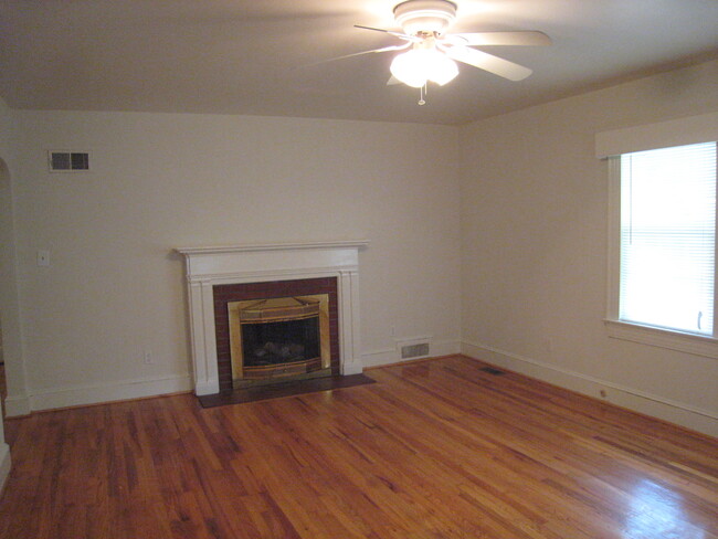 Family room. - 1911 E 4th St