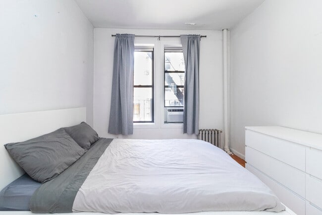 Building Photo - 315-317-317 E 95th St