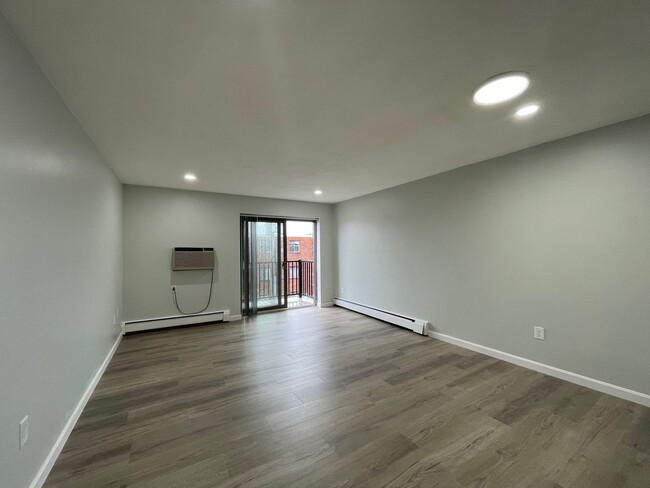 Building Photo - Renovated 2-Bedroom Condo with Balcony, Po...