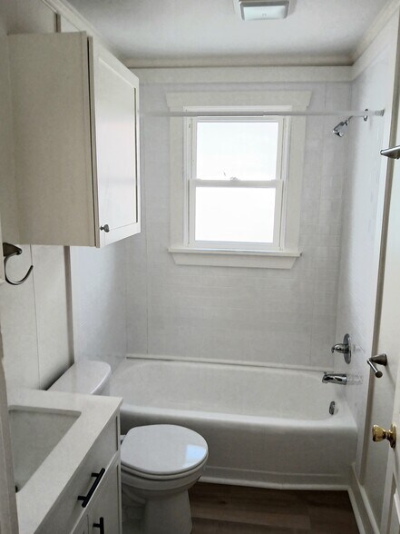 refinished tub, new shower walls - 809 W Osborn Rd