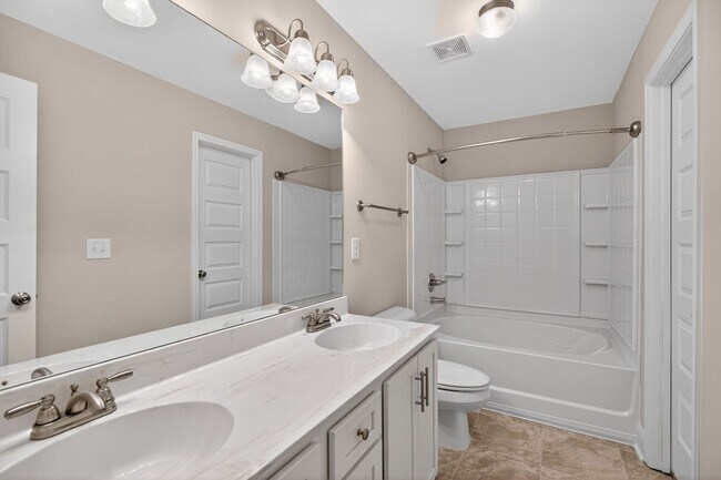 Building Photo - Move-In Ready Gem with Main-Level Owner's Suite