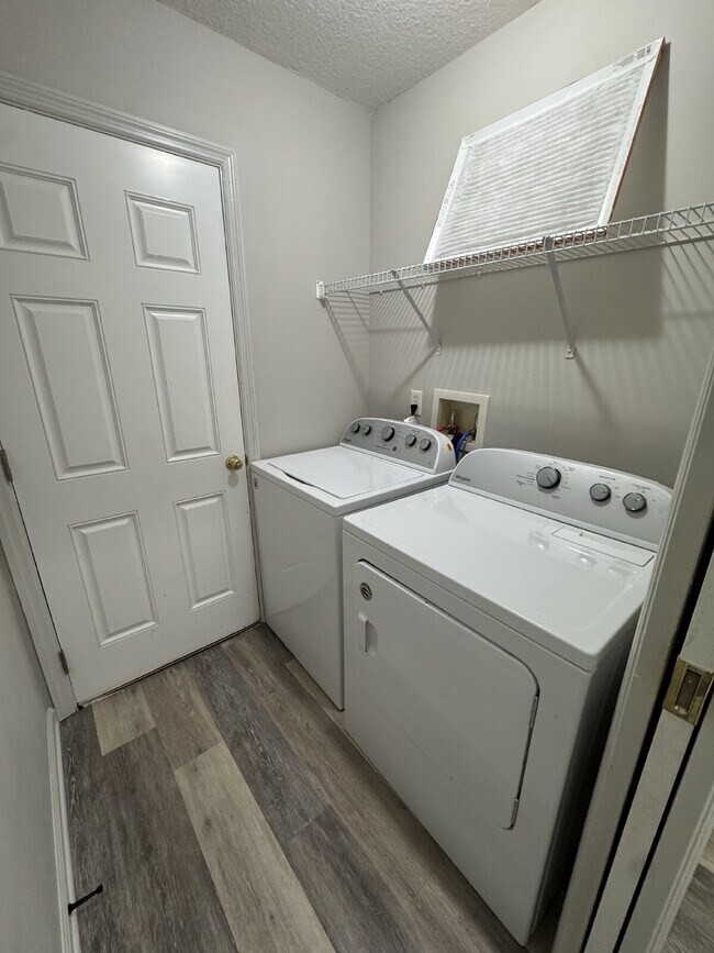 Building Photo - Spacious 4 Bedroom Pond-View Home with Upg...