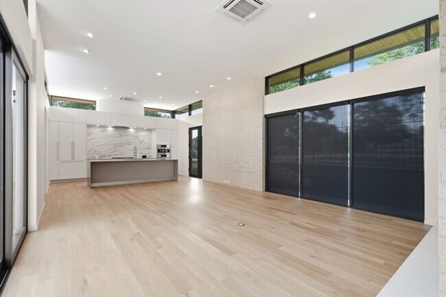 Building Photo - Experience contemporary luxury in this exceptional custom-built Midtown Tulsa residence, where so...