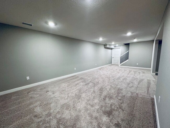 Building Photo - {13305} Less Than 2 Year Old 1.5 Story in ...
