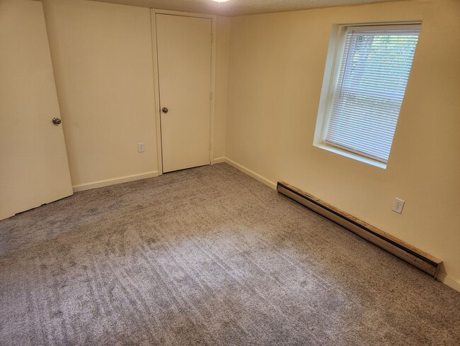 Building Photo - Affordable Apartment Outside the City Limits
