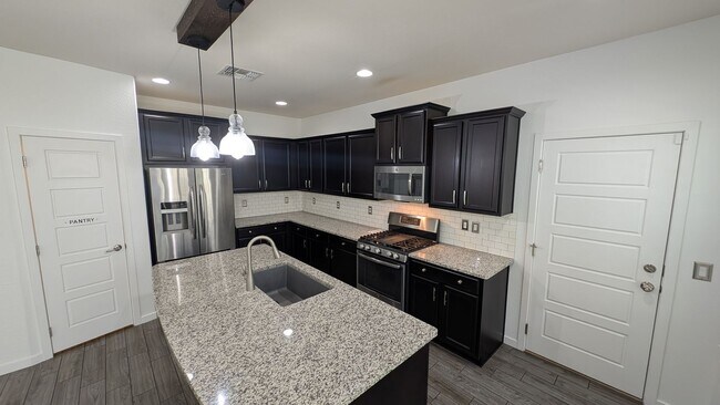 Building Photo - 3 Bedroom Home in the Mulberry Community Near S Signal Butte Rd and E Guadalupe Rd!