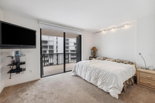 Building Photo - 10175 Collins Ave