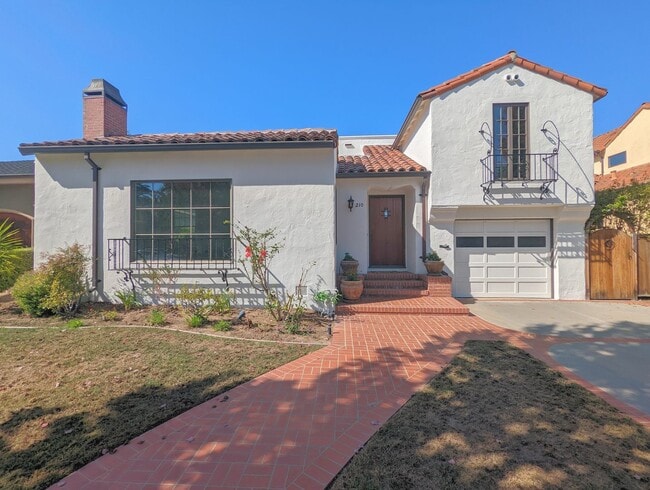 Primary Photo - Spanish-Style Home on Treelined Street in ...