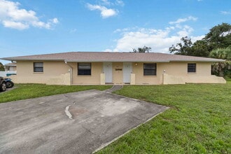 Building Photo - "Charming 2-Bedroom Duplex in Port Charlotte1"