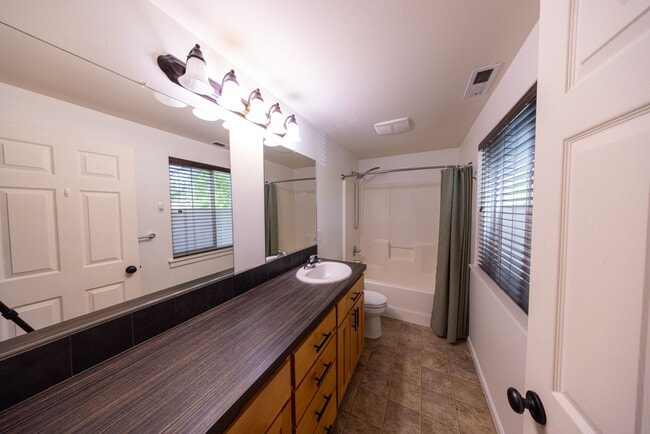 Building Photo - Three bedroom home one block from Battle Ground Village. - With AC