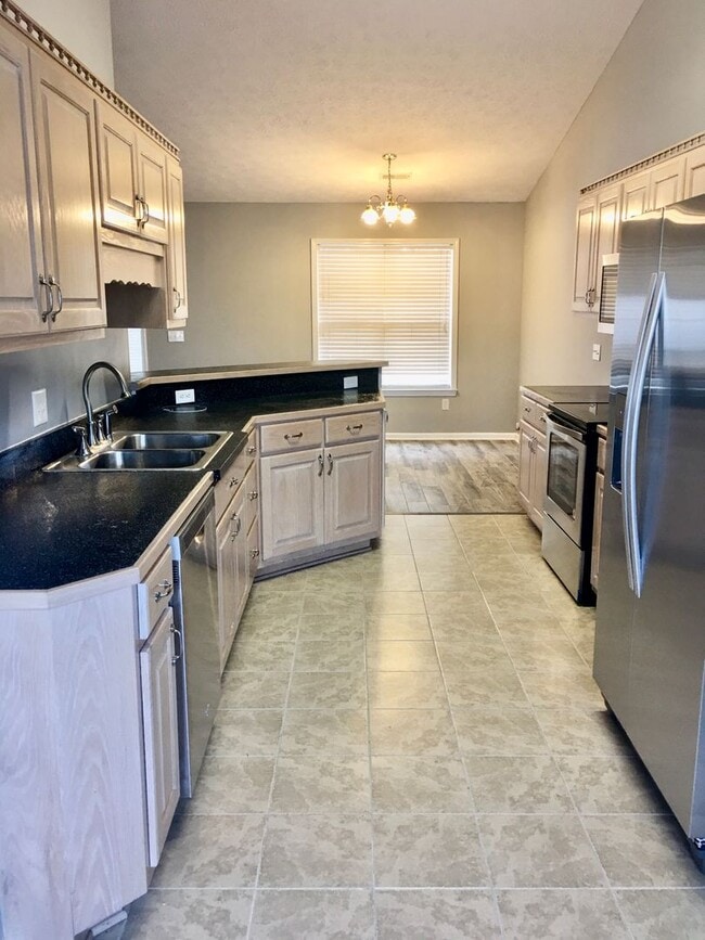 Building Photo - Coming Soon! 4 Bedroom 2 Bathroom Home