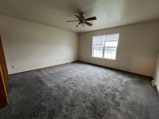 Building Photo - Spacious 2BR Townhomes with Garage & In-Unit Laundry – Stoughton