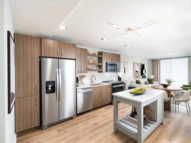 Large chef's island with built-in storage and ENERGY STAR® stainless steel appliances. - Modera LoSo