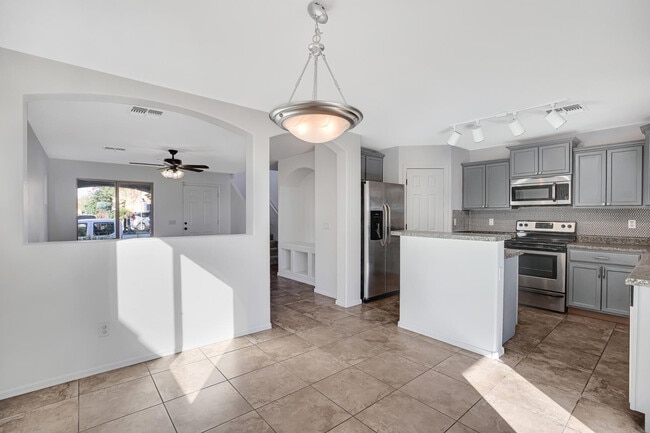 Building Photo - 9547 E Belmont Ave