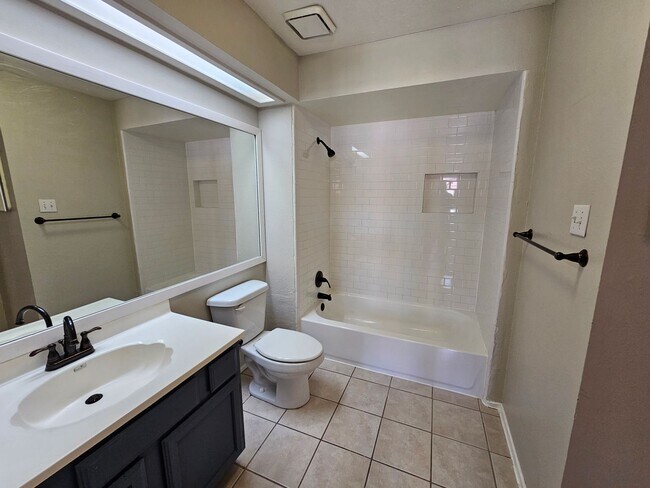 Building Photo - Stunning two-level, two-bedroom, one-and-a-half-bathroom townhome