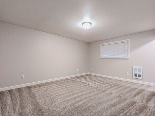 Building Photo - Updated & move in ready 3 bed 2 bath rambler w/ 2 car garage!