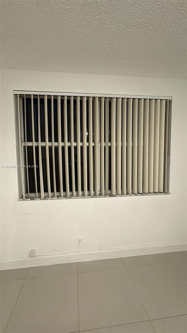 Building Photo - 9055 Wiles Rd