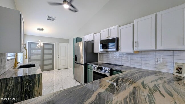 Building Photo - 10867 W Chino Dr