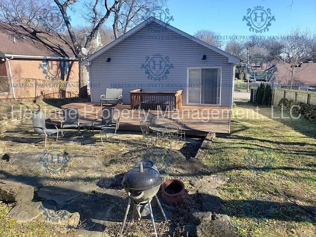 Building Photo - Deck, Large Yard, Charming and Convenientl...