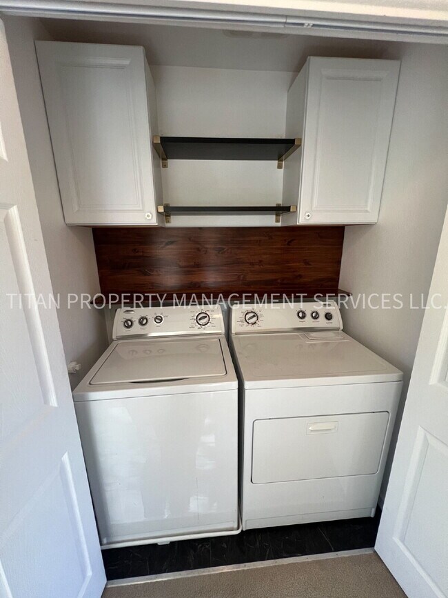 Building Photo - Beautiful Three Story Townhouse with Gas Fireplace, Balcony & 2-Car Garage