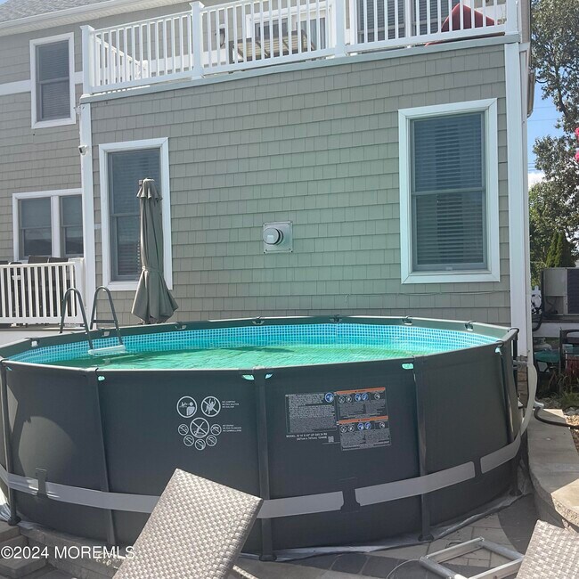 Building Photo - 45 E Pampano Dr