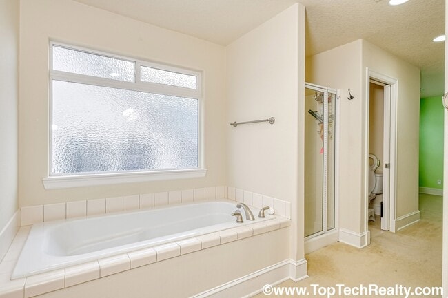 Building Photo - Beautiful 4 Bedroom | 2.5 Bathroom | 2,540 Sqft. Home | Central A/C | Solar Panels | Located in B...