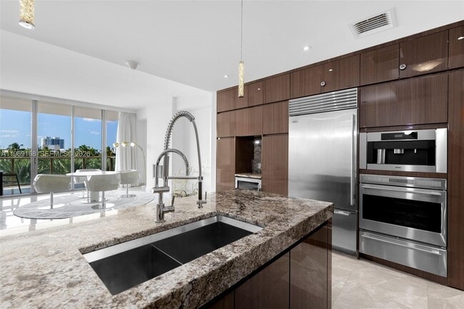 Building Photo - 9701 Collins Ave