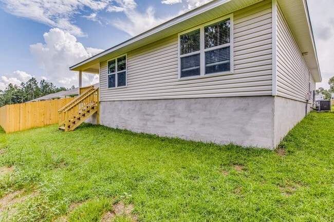 Building Photo - Welcome to Taylor Ridge, a new community in Pensacola.
