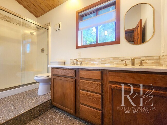 Building Photo - Waterfront Living in Indianola – Dock, Bea...