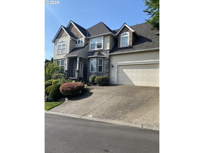 Building Photo - 9587 NW Caxton Ln