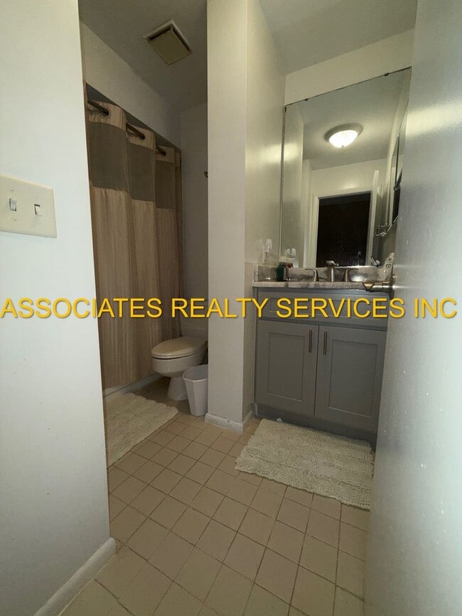 Building Photo - Partially Furnished 2-Bedroom Condo with D...