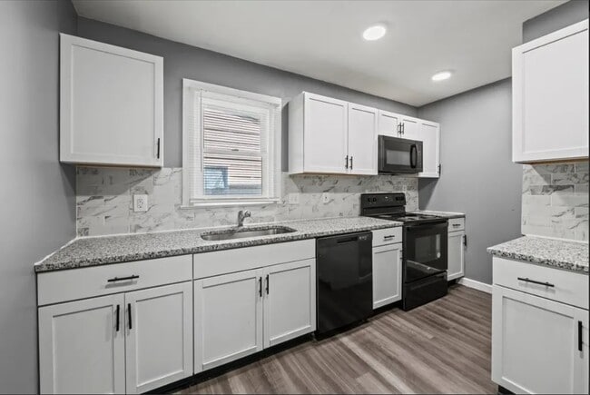 Building Photo - 409 N Temple Ave