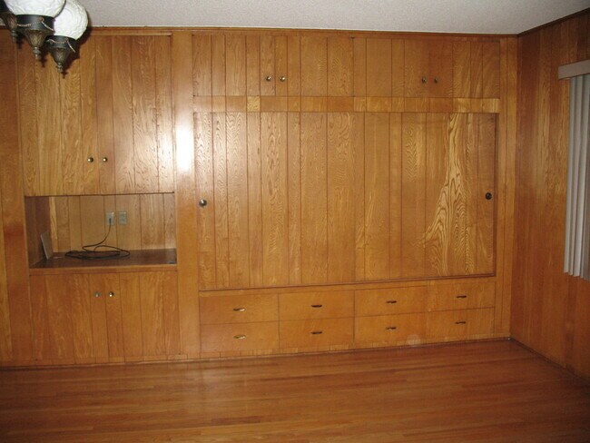 More built-in cabinets. Space for TV or media equipment - 3121 W Wyoming Ave