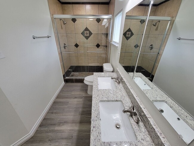 Building Photo - This fully renovated 3-bedroom, 2-bath home features a modern kitchen, large master suite with a ...