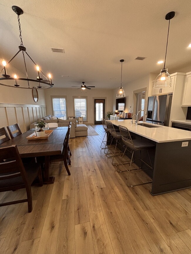 Building Photo - Need Space?  How about 5 bedrooms, 2.5 baths + an extra bonus area upstairs so that the kids can ...