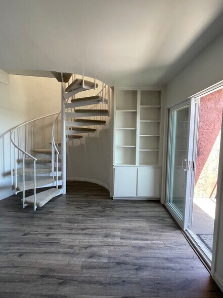 Living Room/Spiral Staircase Built in Shelves - 2222 Carmel Valley Road