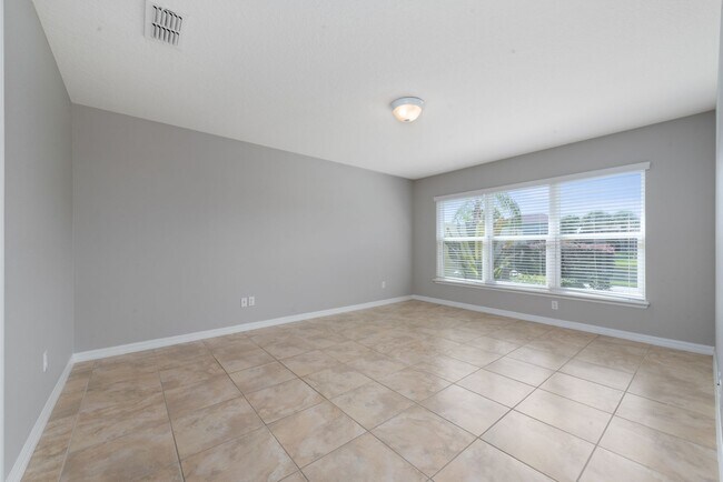 Building Photo - Deluxe Villa Lake view all Tile. 3 Bedrooms+2 Baths