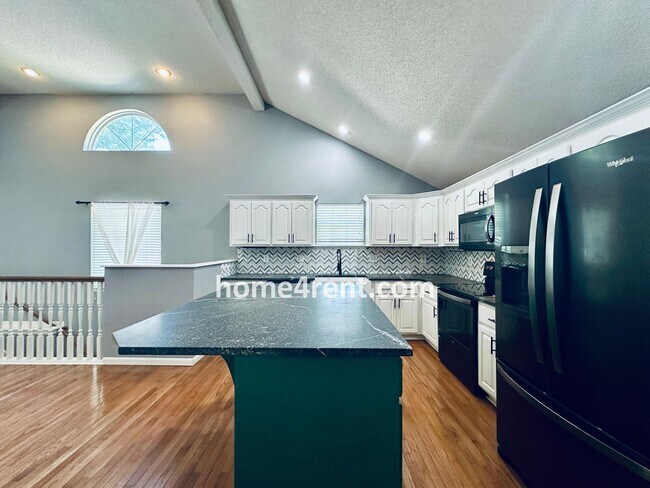 Building Photo - Overland Park Raised Ranch, Primary Suite ...