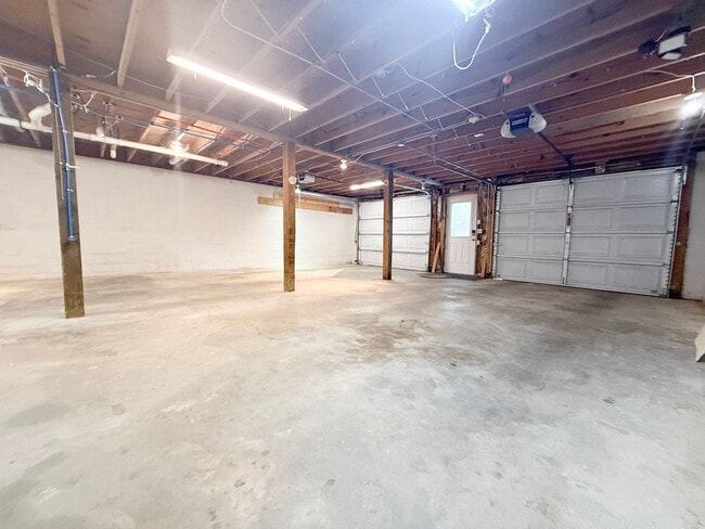 Building Photo - Spacious 3-Bedroom Home with Screened Porch, 2-Car Garage + Workshop