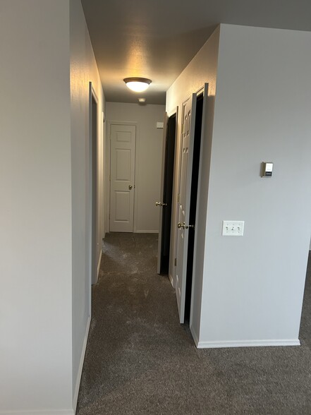 Hallway with 3 closets - 909 Dimaggio Dr