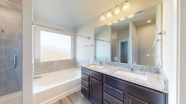 Building Photo - Discover this spacious 4-bedroom, 2-bath home with 3 CAR GARAGE!!!