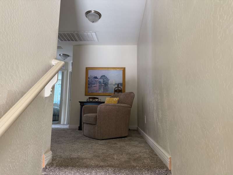 Top of stairs landing - 900 W Broadway Ave